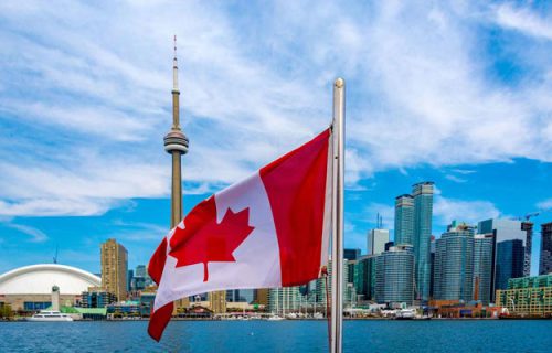 canadian-flag-and-toronto-skyline-2018-billboard-1548-1615587826-compressed3